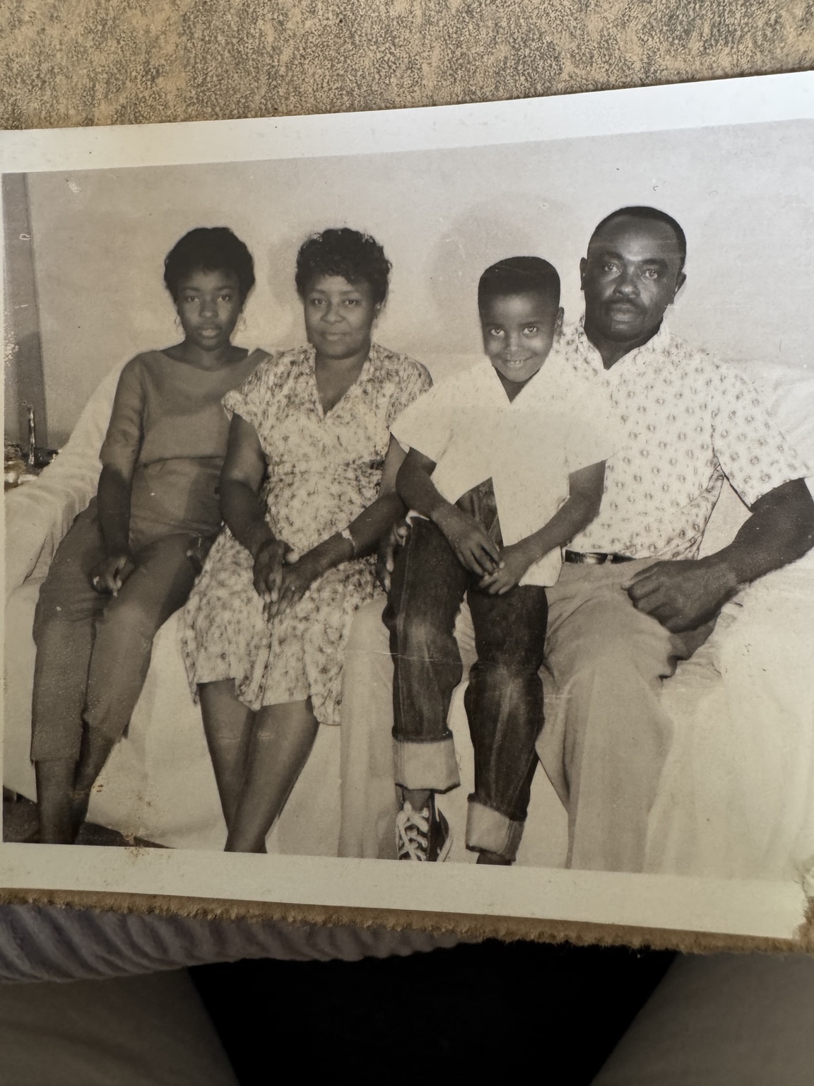 An original childhood photograph of Ken Taylor with his family
