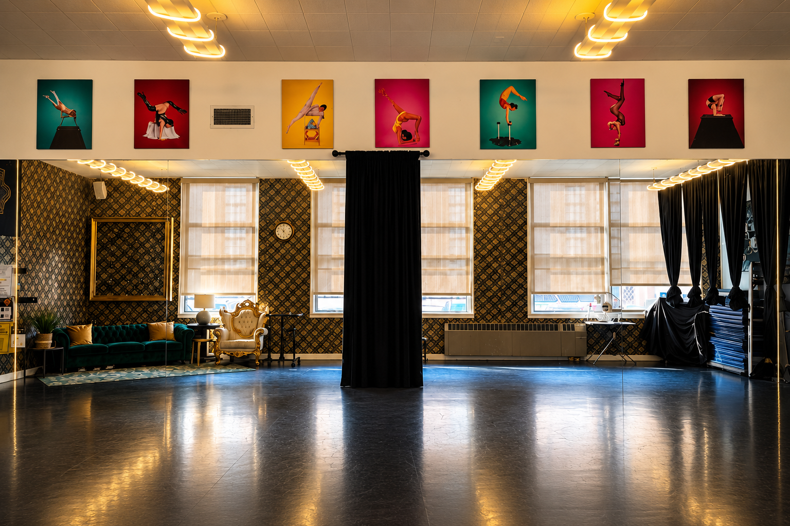 The Art in Flexion studio with an open training floor, mirrors, and warm lighting
